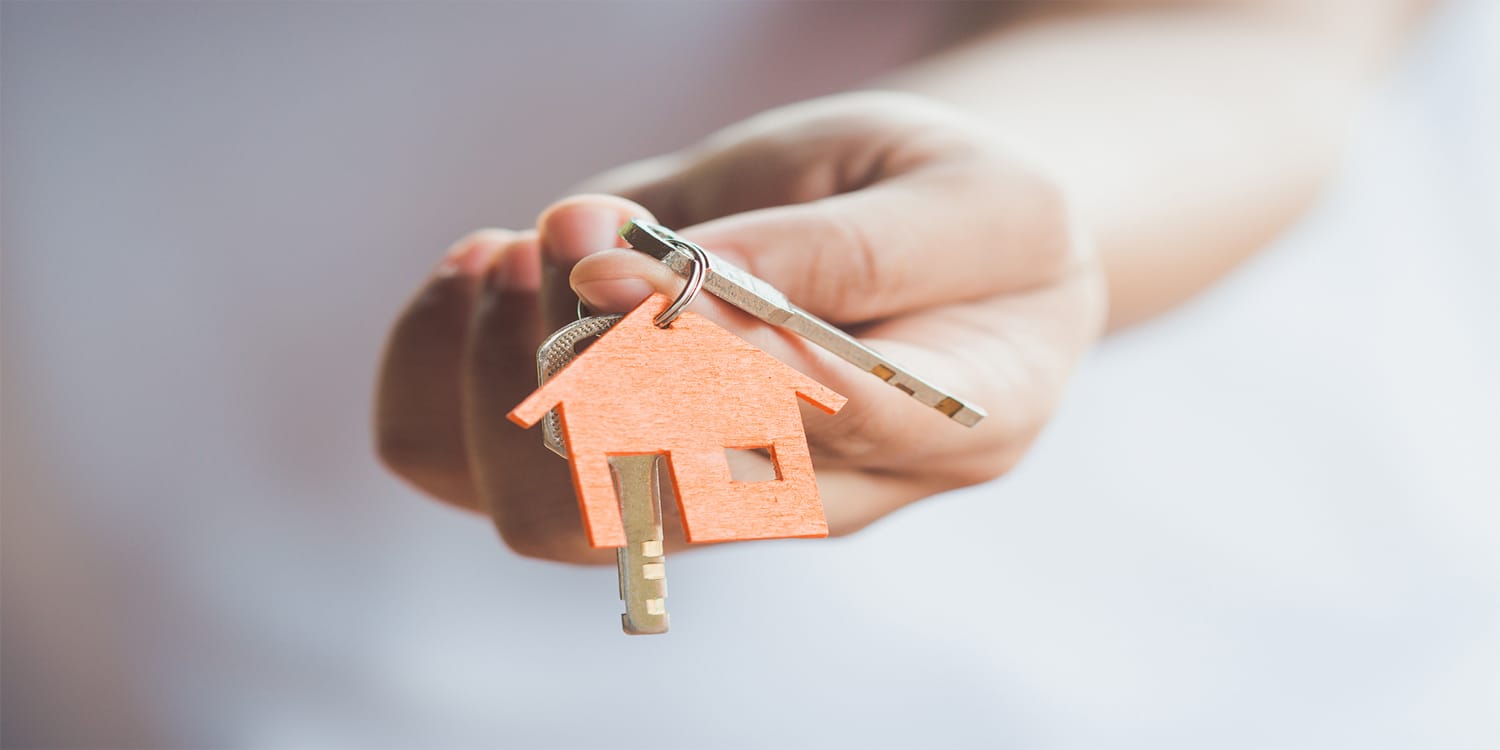 Handing over keys - rental property owner concept